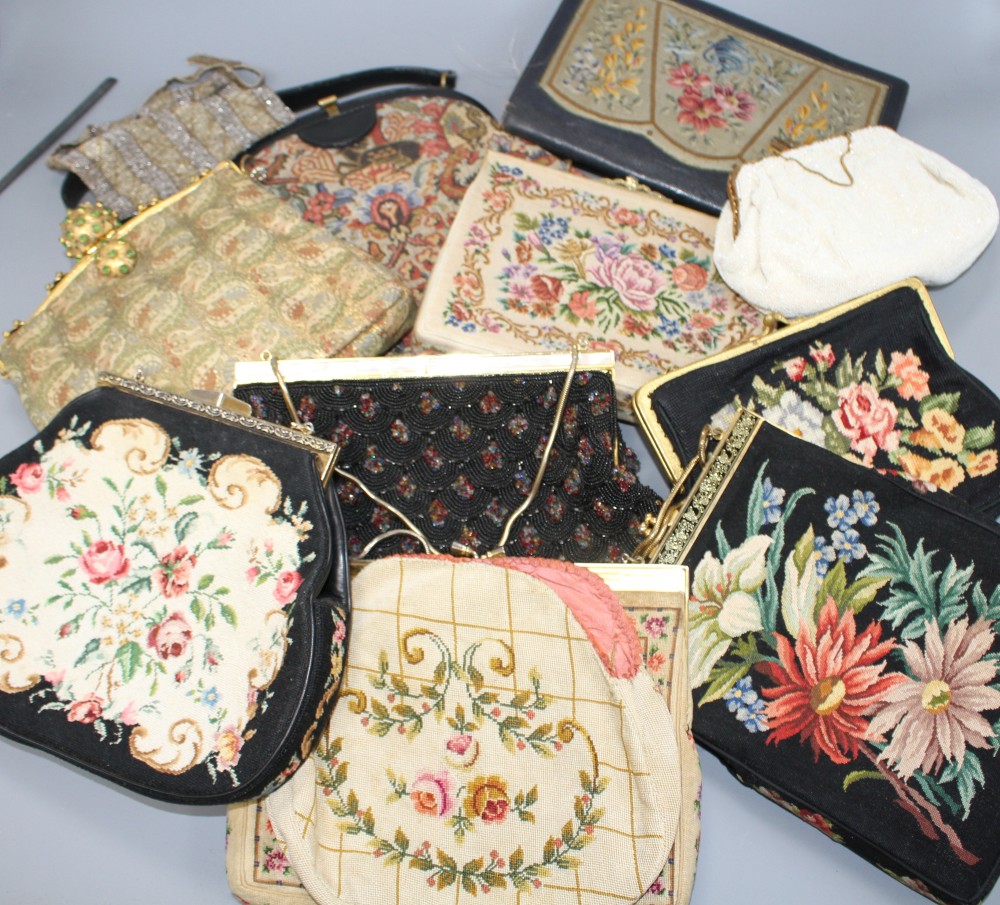 A collection of assorted vintage bags and evening purses